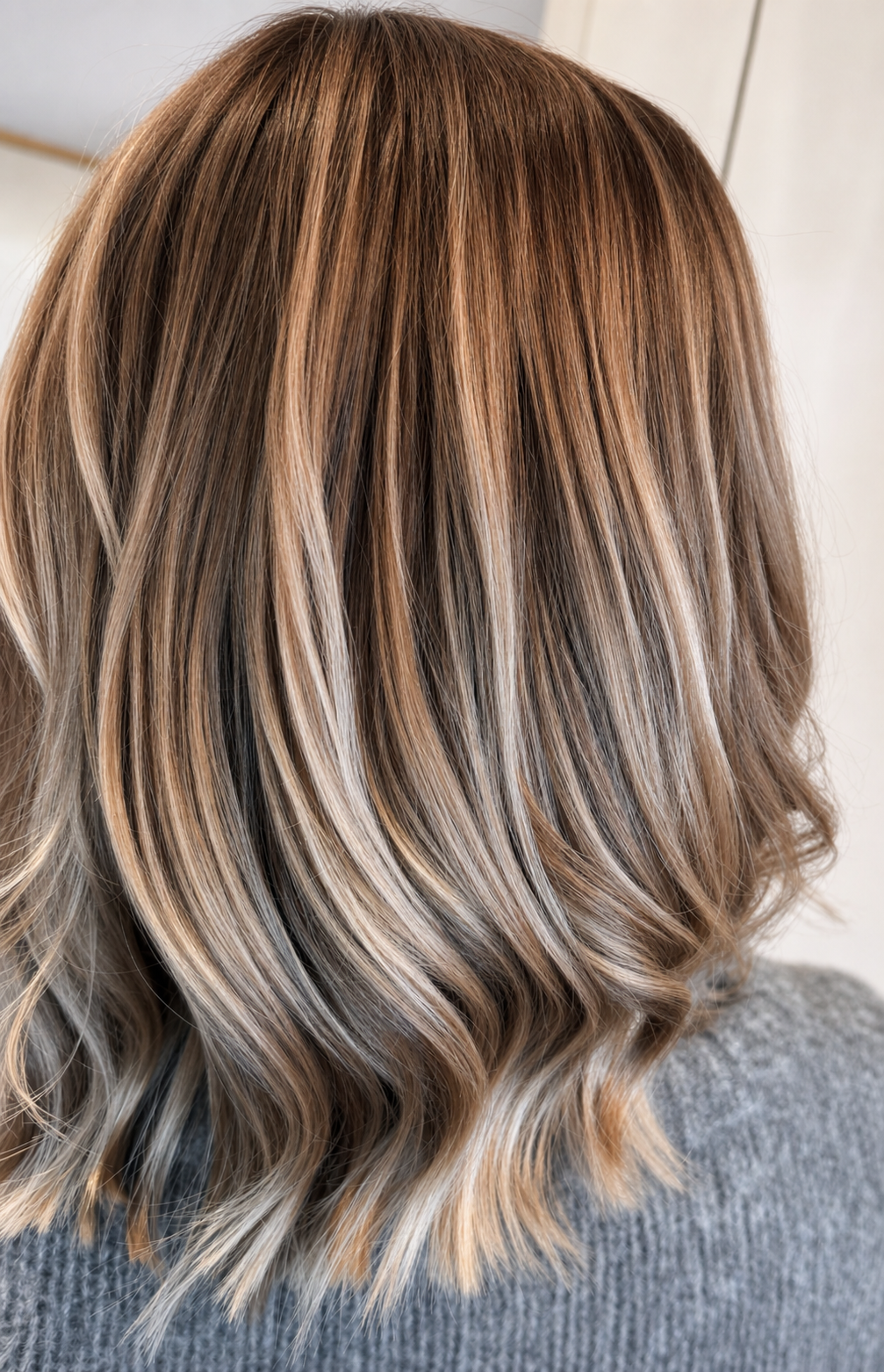Blonde-brown dimensional hair colour with soft blended tones